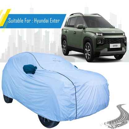 Hyundai Exter waterproof all-weather car body cover by Bull Rider, shown draped over the vehicle for protection against weather.